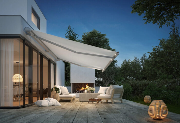 Markilux awning - ivory fabric and silver frame at night